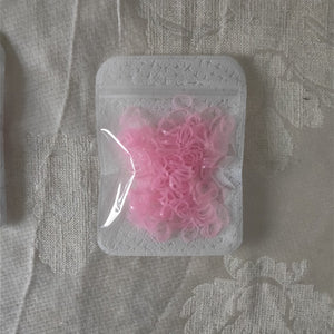 TPU Pet grooming rubber band Dog headwear Dog Teddy York rubber band 20g about 360PCS 2mm